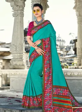 Elegant Aqua Blue Silk Saree with Printed Design and Contrasting Blouse