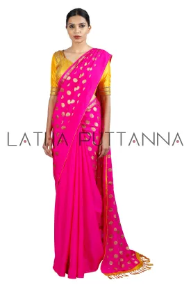 Kumkuma - Dramatic Pink Saree with Gold Polkas