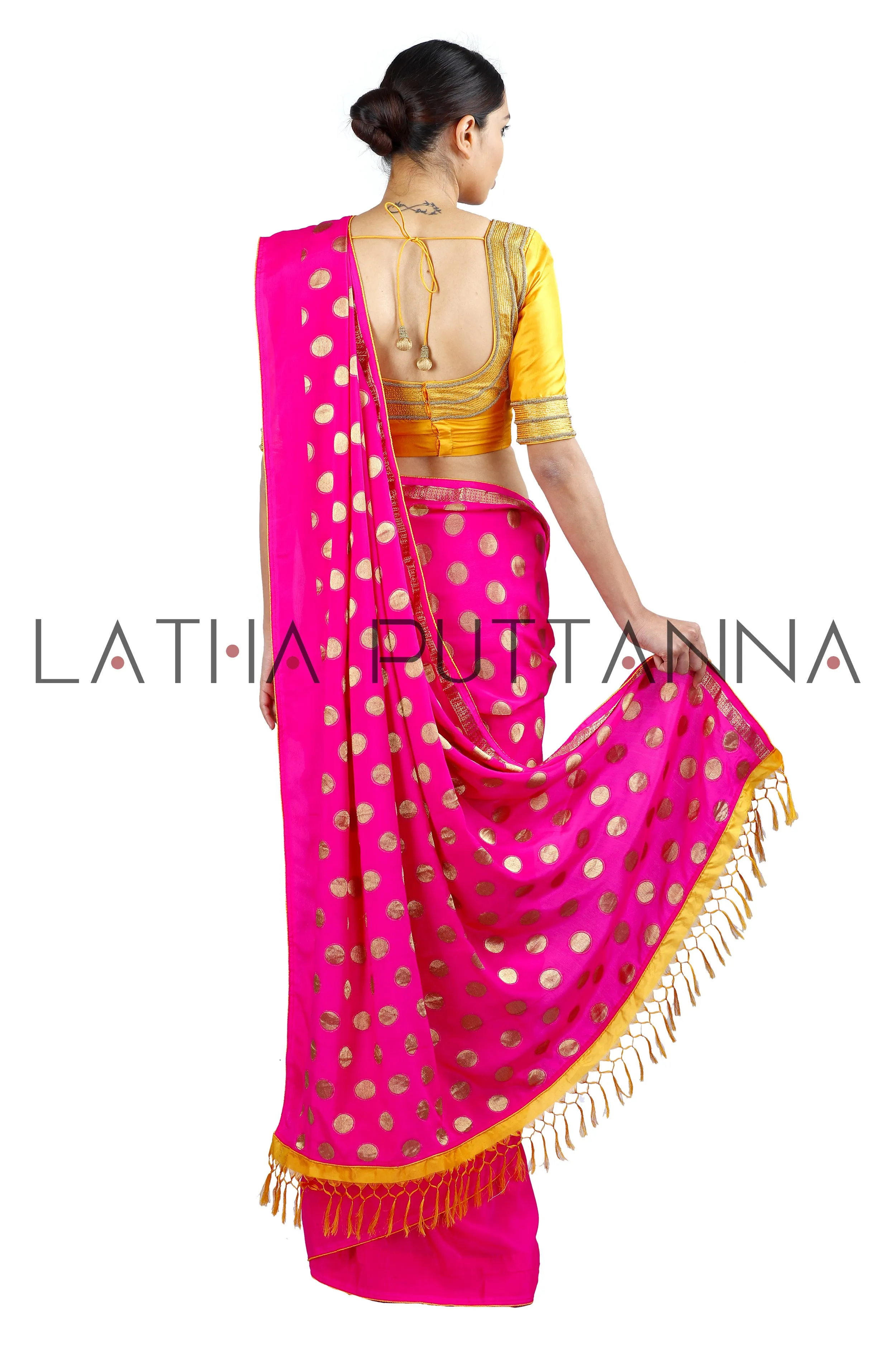 Kumkuma - Dramatic Pink Saree with Gold Polkas