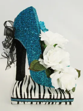 Turquoise high heel shoe with white roses centerpiece